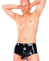 (Bild für) Latexslip mit fester Penishülle und Analdildo - zum Schließen ins Bild klicken